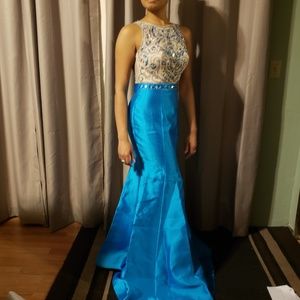 Beautiful beaded blue illusion prom dress